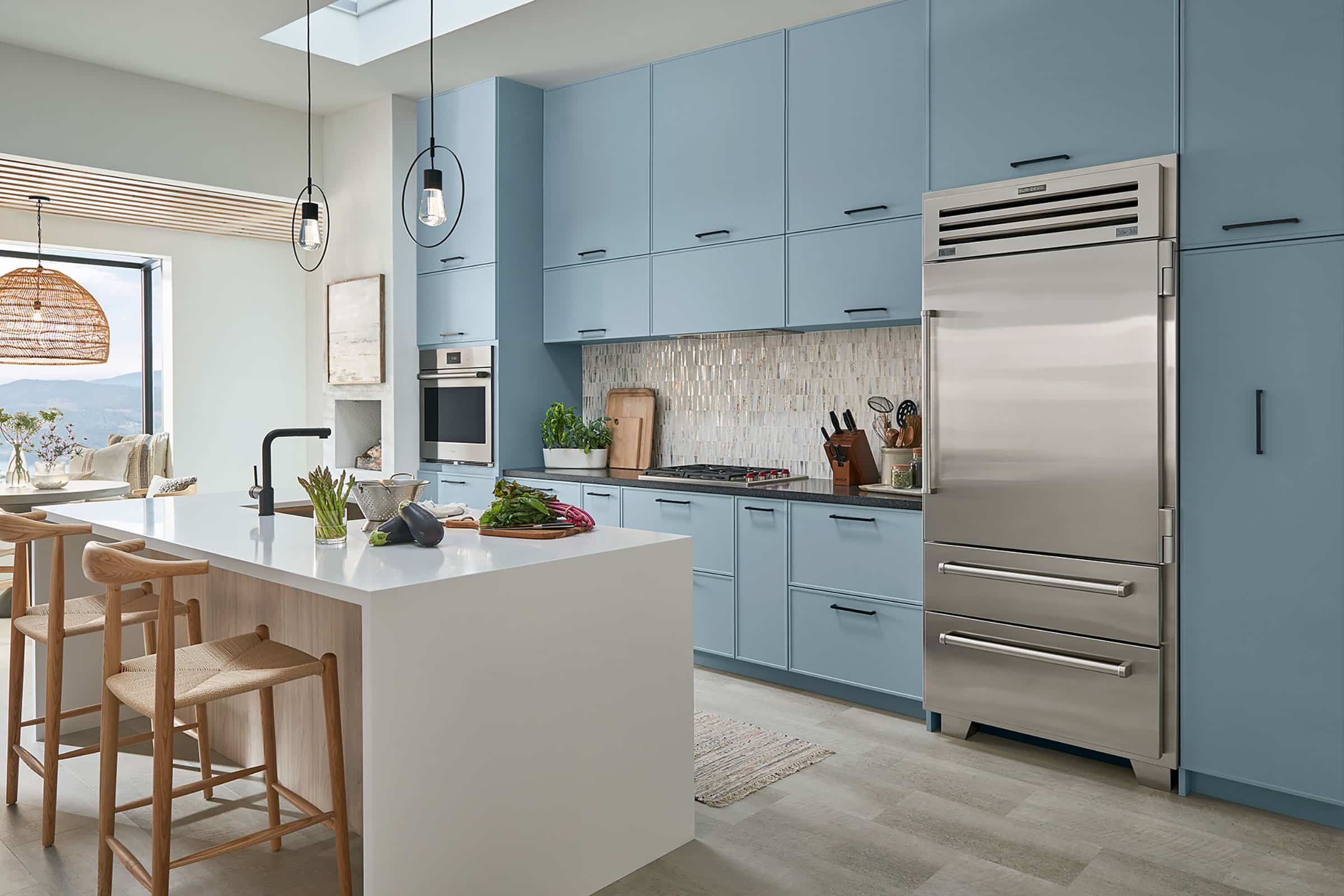 Blue kitchen with high-end appliances